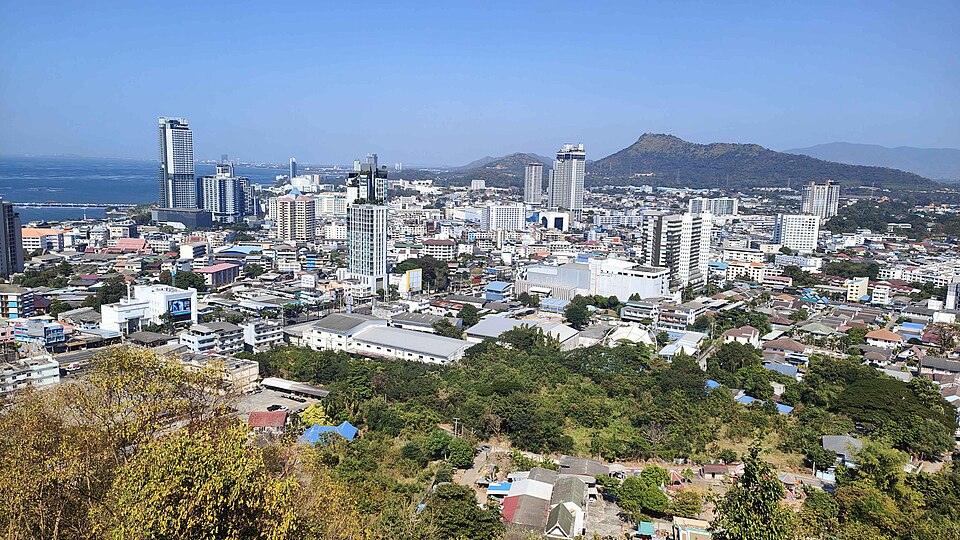 A city skyline that includes skyscapers and other buildings.