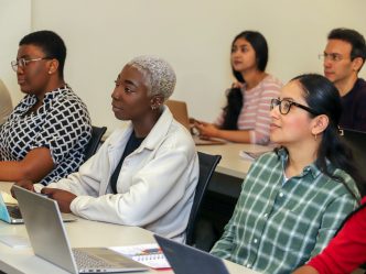 students listening to speakers