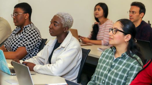 students listening to speakers