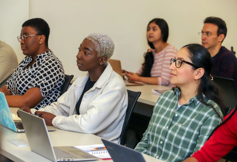 students listening to speakers