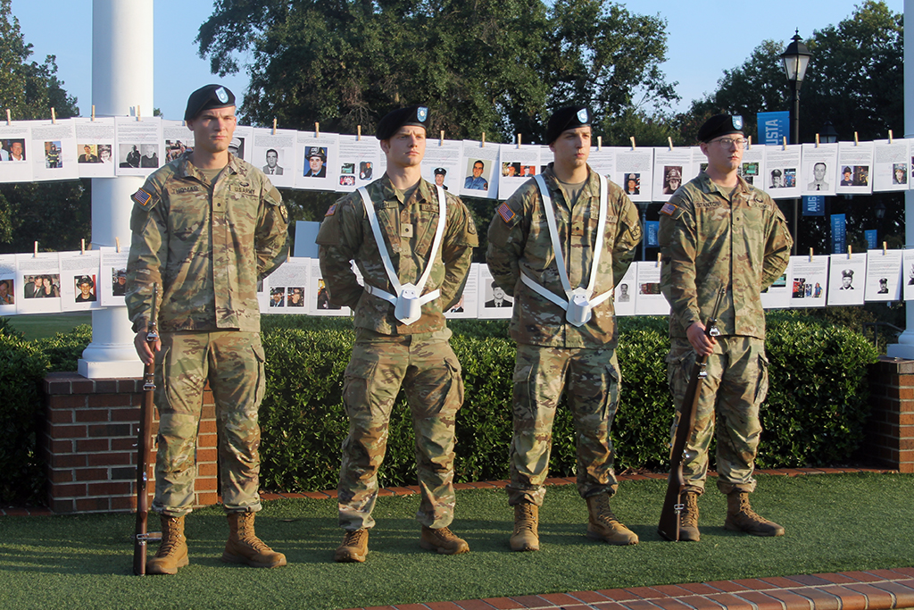 Men in uniform standing at attention