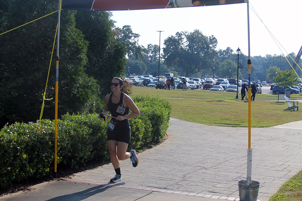 Female runner finishing a race
