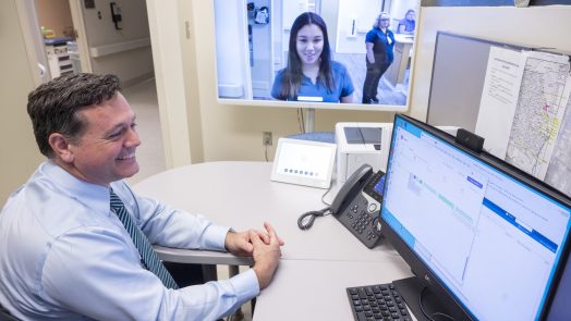Man looking at a telehealth screen