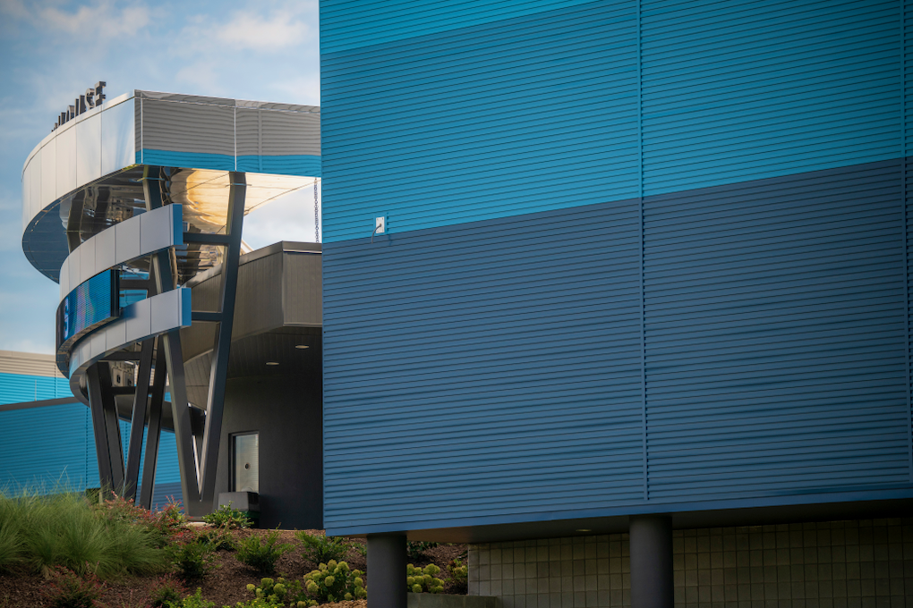 The outside of a sports arena.