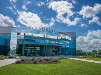 The outside of a sports arena.