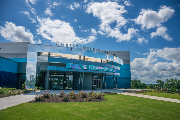 The outside of a sports arena.