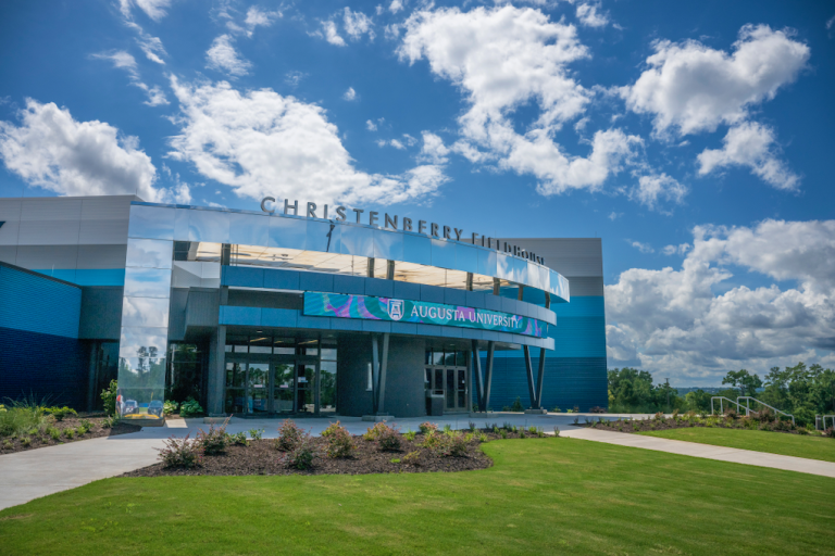 The outside of a sports arena.