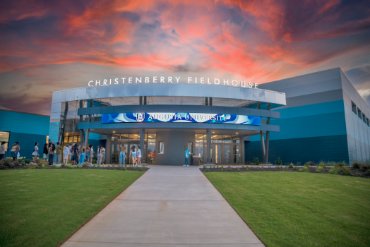 The entrance to a building with students in front.
