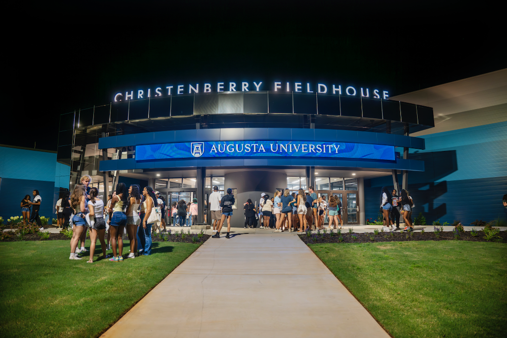 The outside of a sports arena.