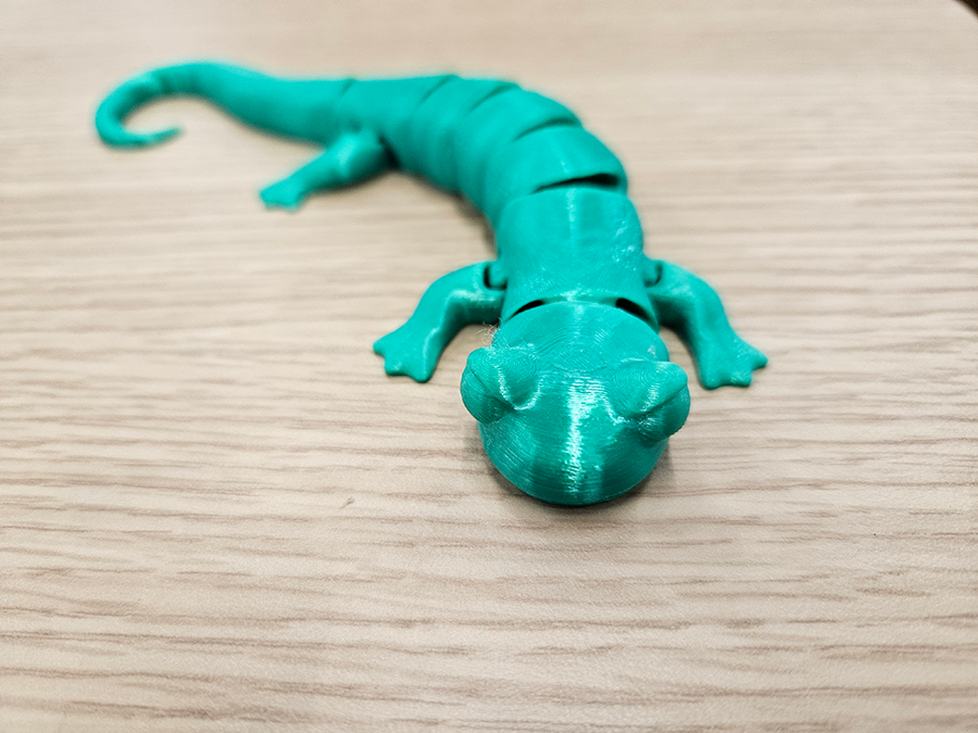 A 3D-printed model of a gecko lizard.