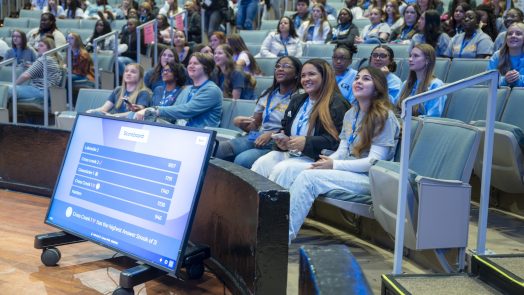 A group of students in a theater.