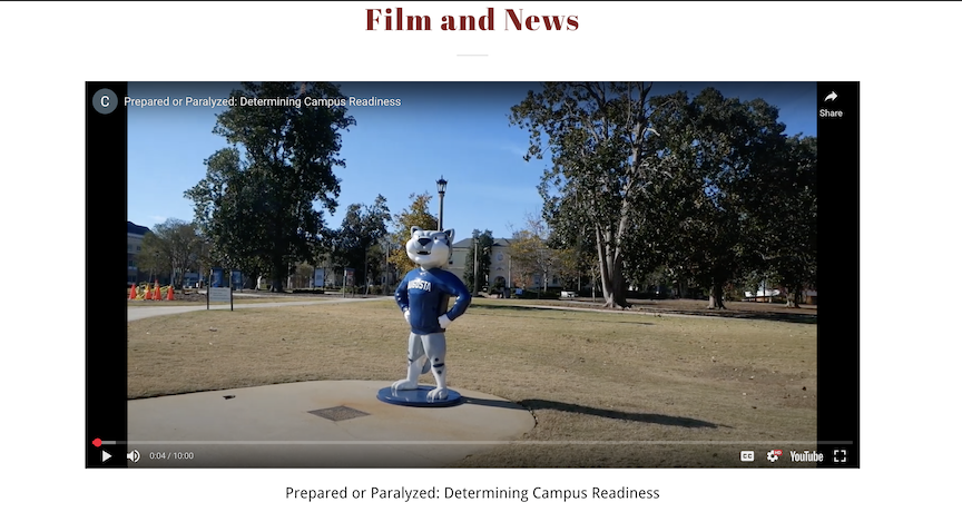 A screenshot of a video that starts with a statue depicting a college mascot shaped like a jaguar.