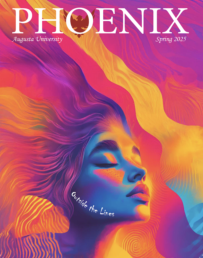 The cover of a magazine titled "Phoenix" with artwork depicting a woman's face and her hair blowing in the wind.