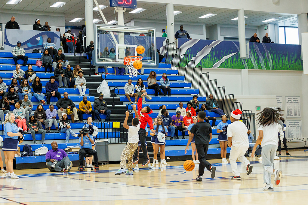 Boys and girls shooting baskets