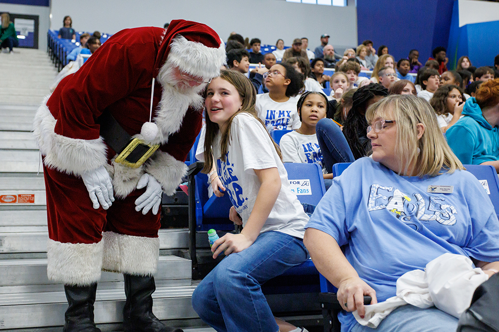Santa Claus talking with a girl