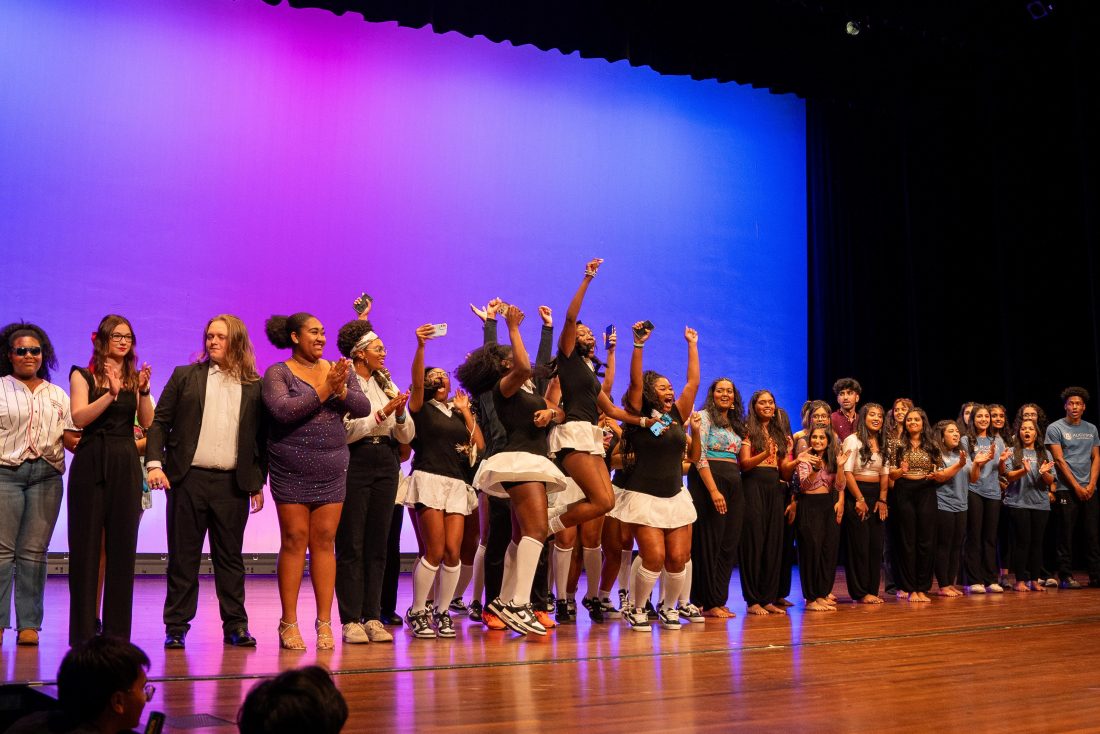 Unity Talent and Art Show contestants lined up on the stage at the Grover C. Maxwell Performing Arts Theatre.