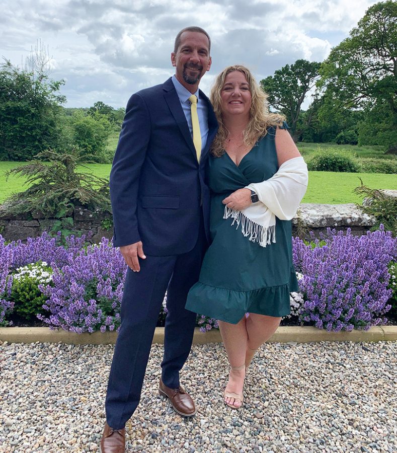 Smiling man and woman in garden