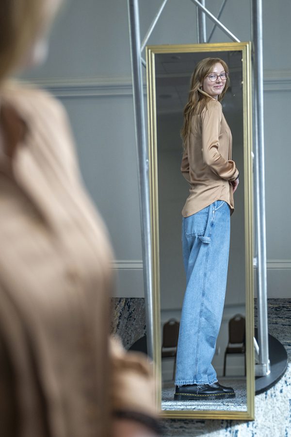 Woman looking in a mirror