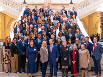 Public Health Day students on the stairs.