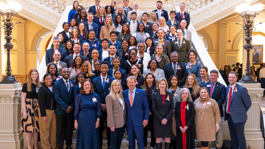 Public Health Day students on the stairs.
