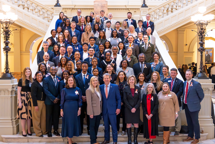 Public Health Day students on the stairs.