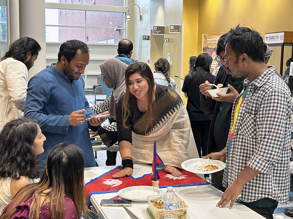 Men and women talking at a table