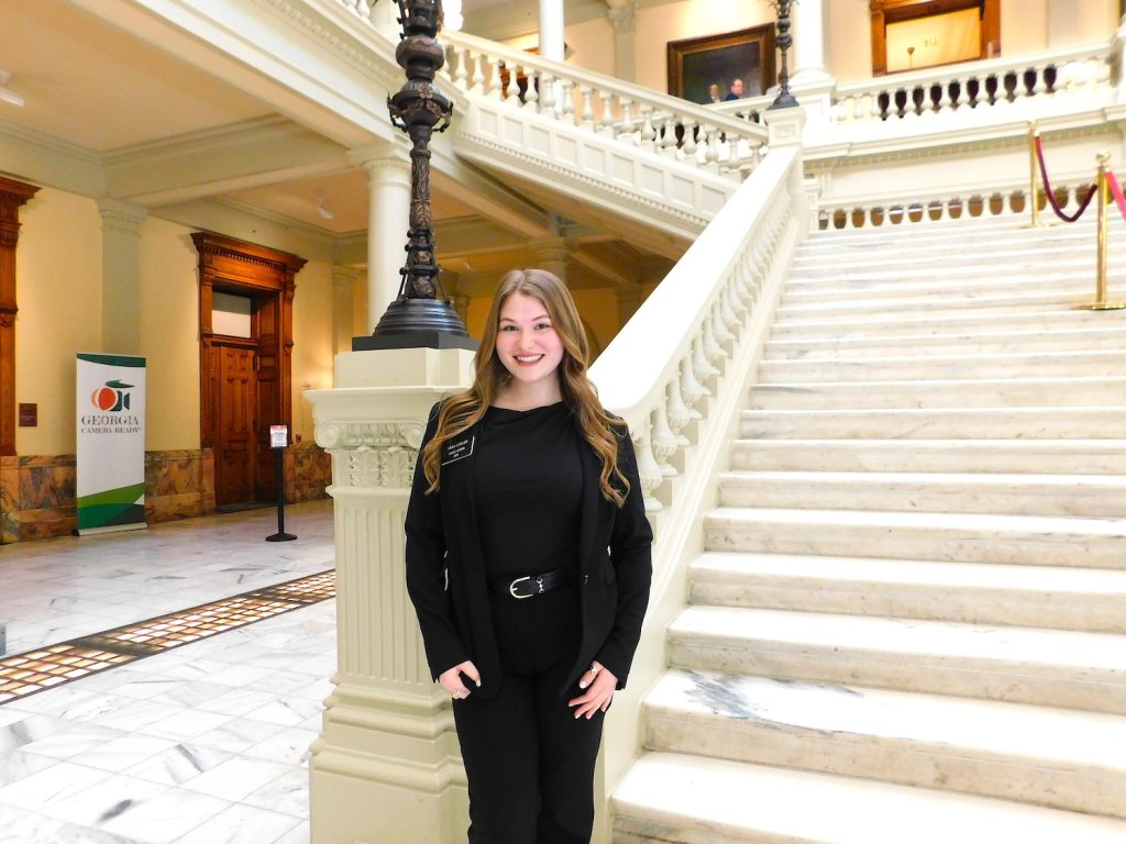 Woman standing in the Capitol