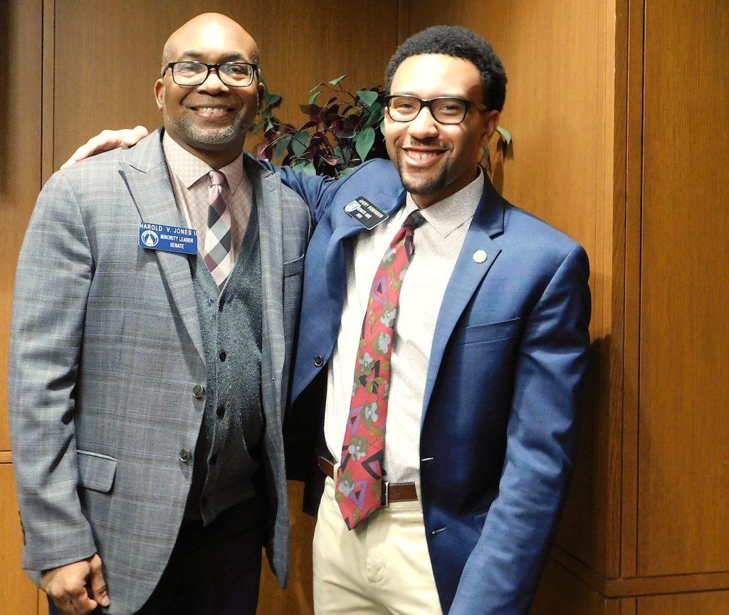 Two men standing together