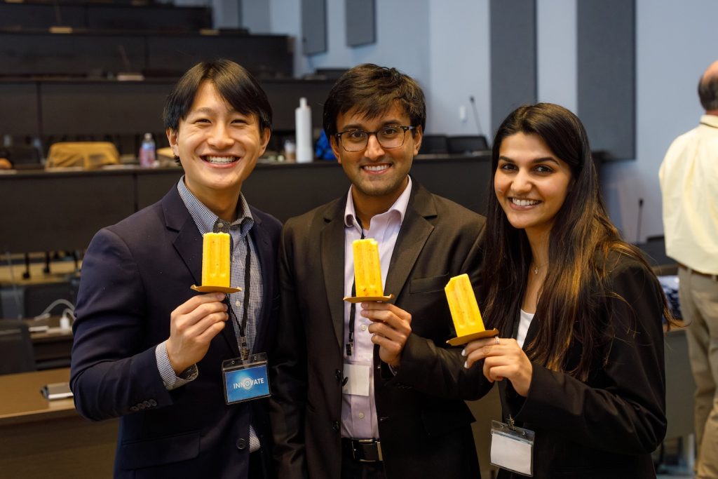students enjoying popsicles
