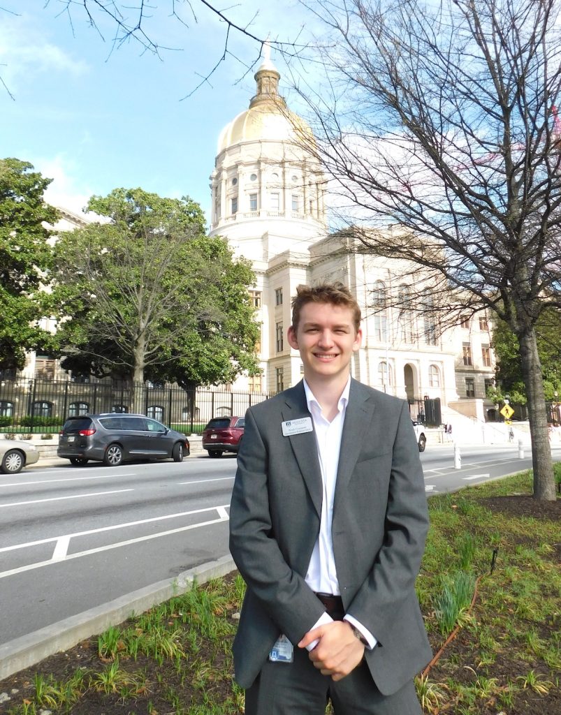 Man standing in front of the Capitol