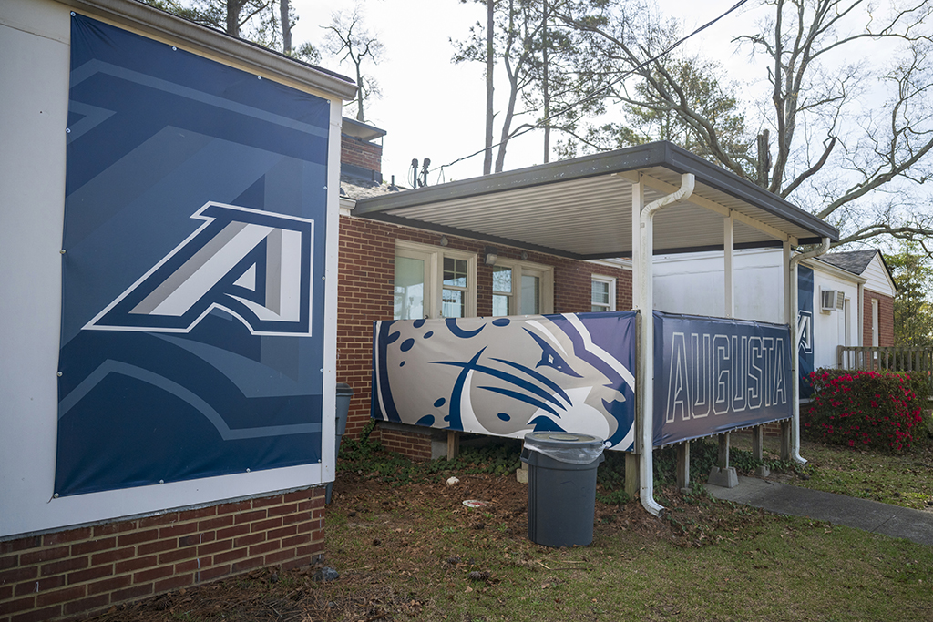 New AU logos hanging on buildings