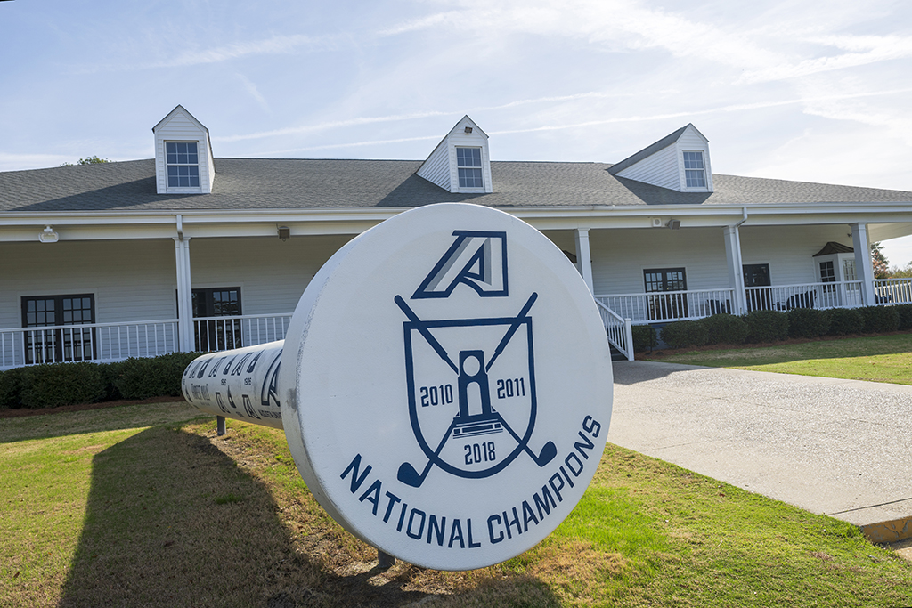 Giant golf tee celebrating men's and women's golf