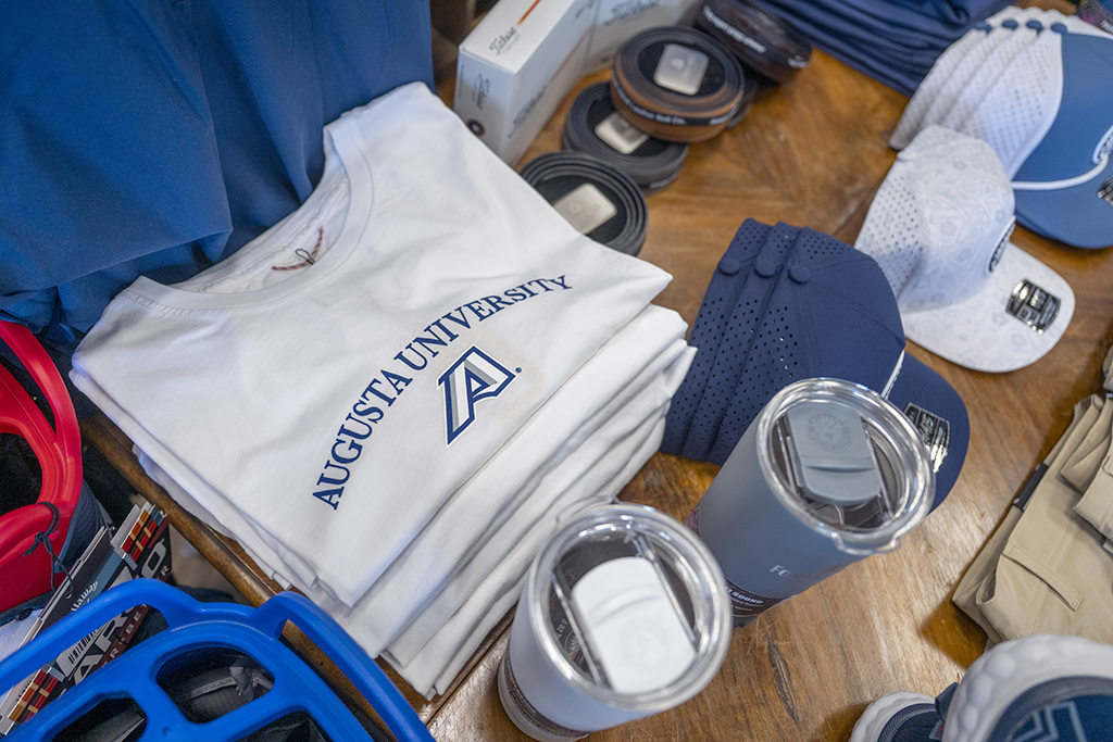 Clothing and merchandise sitting on a table