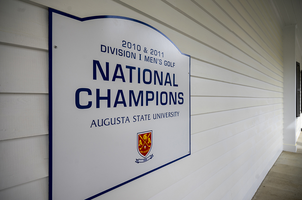 A sign that reads 2010 & 2011 Division I Men's Golf National Champions Augusta State University