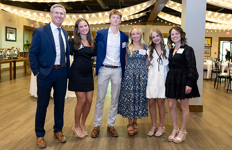 Smiling family in a banquet hall