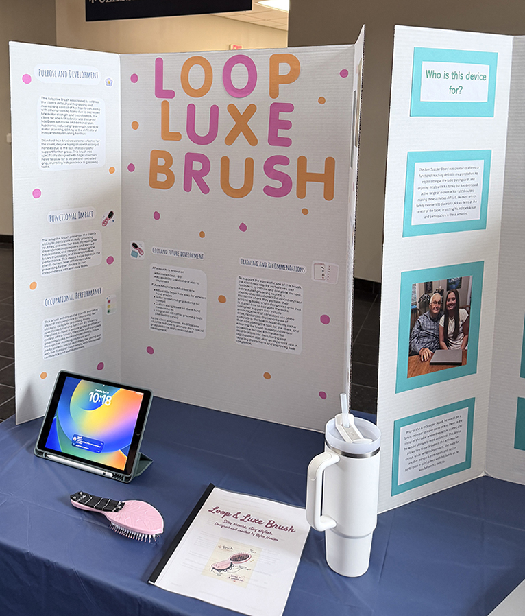 Picture of a poster board with equipment in front of it
