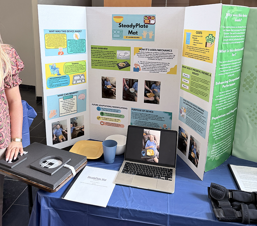 Picture of a poster board with equipment in front of it