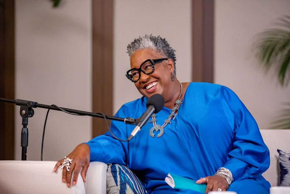 Woman talking in a microphone
