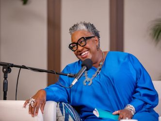 Woman talking in a microphone