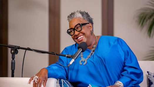 Woman talking in a microphone
