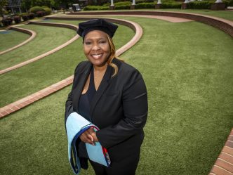 Woman smiling and posing for photo