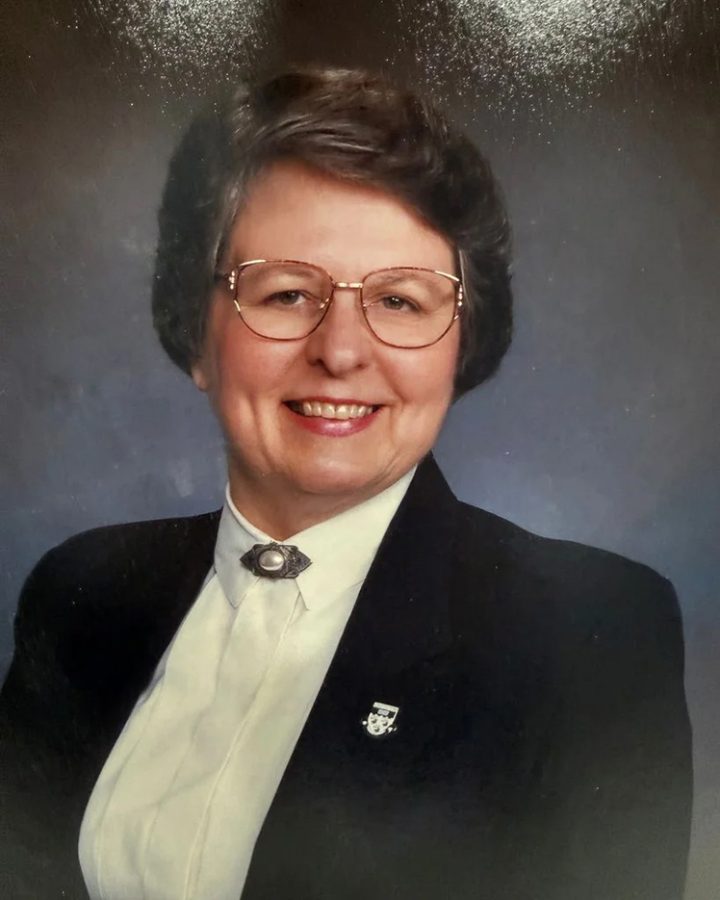 A woman smiling