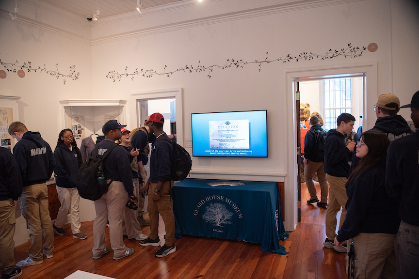 Students inside the Guard House Museum