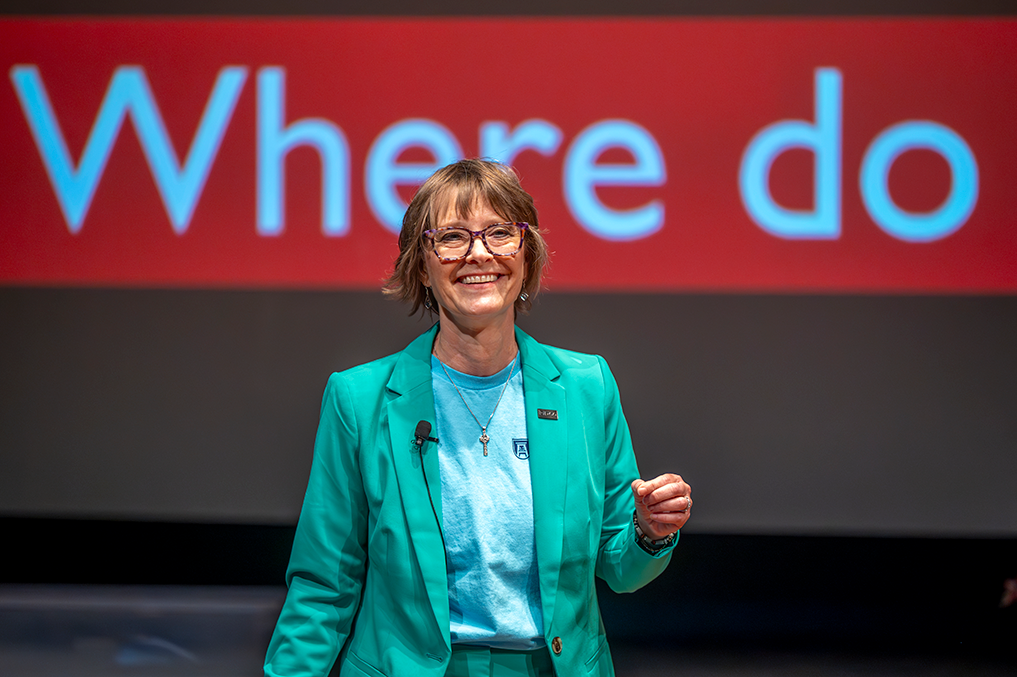 former dean of Dental College of Georgia in front of large screen