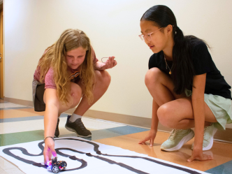 Students attending VICROY Kids Coding Camp testing their cutebots.