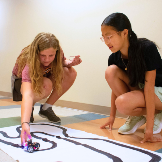Students attending VICROY Kids Coding Camp testing their cutebots.