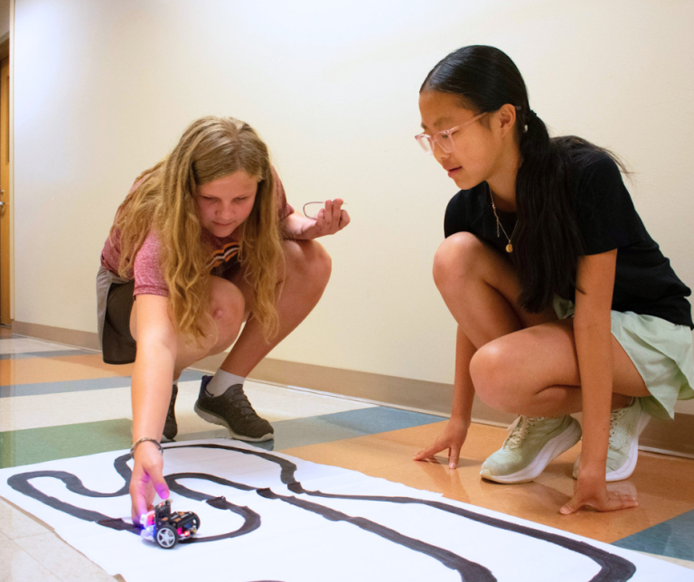 Students attending VICROY Kids Coding Camp testing their cutebots.