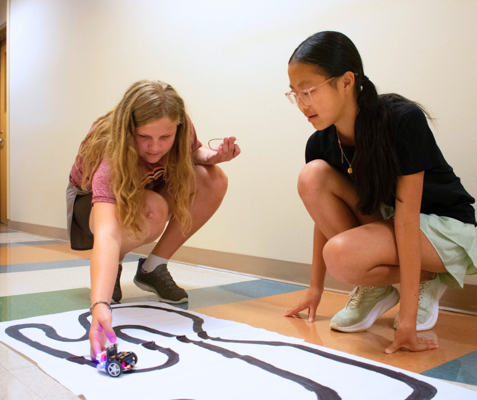 Students attending VICROY Kids Coding Camp testing their cutebots.