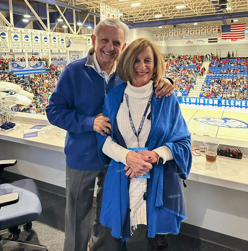 Man and woman at basketball game