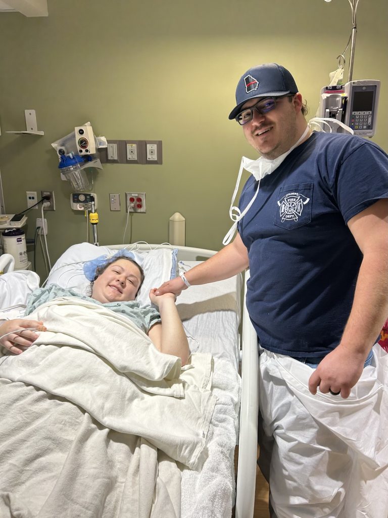Woman and husband in a delivery room